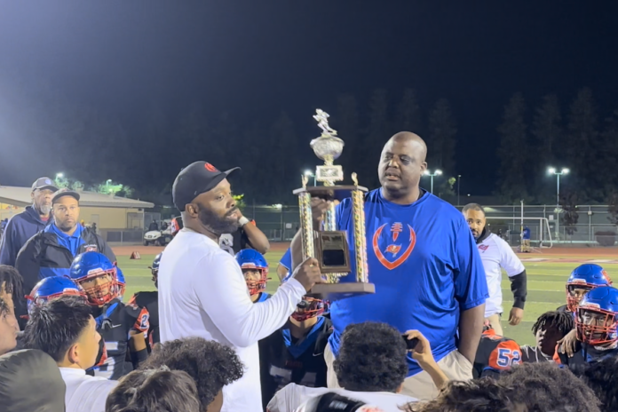 James Logan Football Wins 880 Trophy