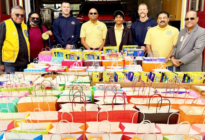 Lions Club and firefighters spread holiday cheer to local children