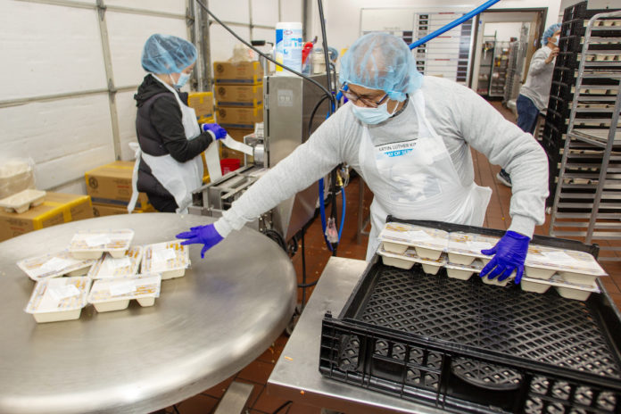 Kaiser volunteers pack meals to honor MLK Day