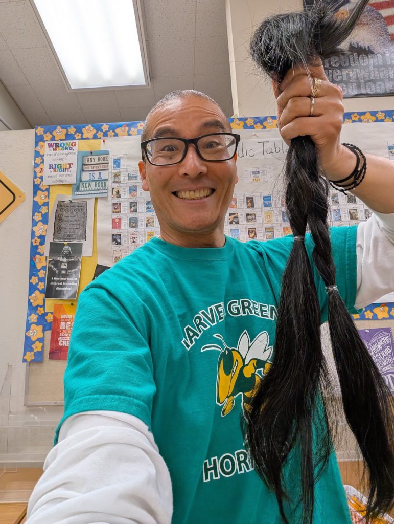 Post cut, Kakutani has the same big smile for the kids. Courtesy of Junichi Kakutani