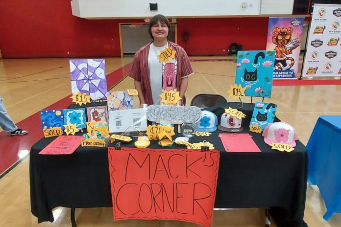 Artist Mack McAvoy enjoyed seeing the different artists styles showcased at the fair. Monika Lee