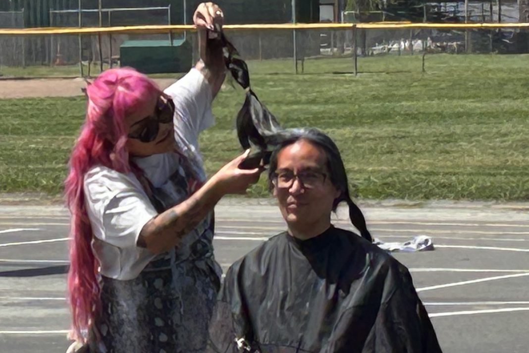 School librarian puts books over looks