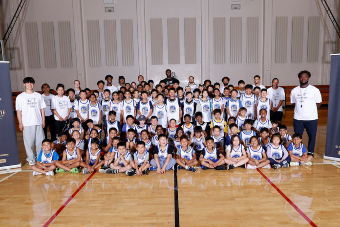 NBA champion visits basketball camp