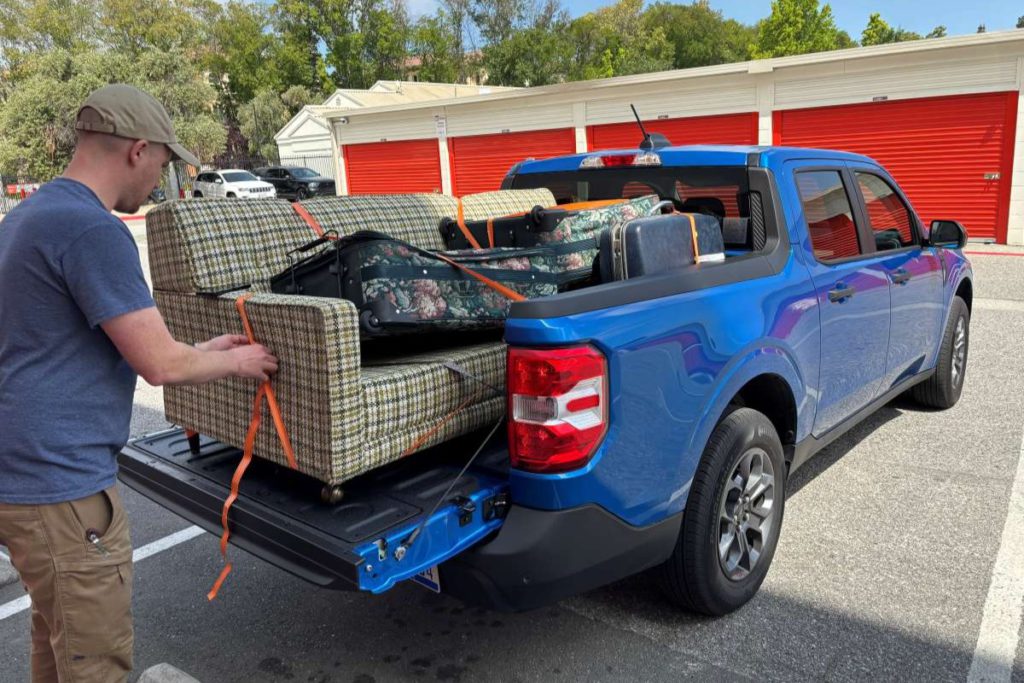 With a dropped tailgate and a few tie-downs, the Maverick’s bed can fit a six-foot sofa. Michael Coates