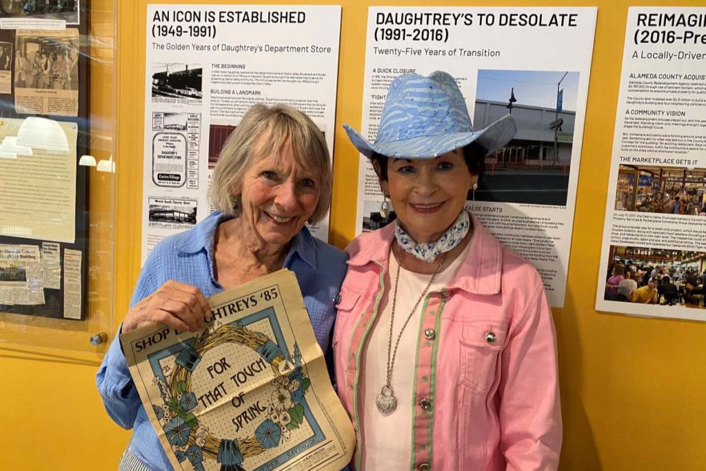  Donna Layburn (left) holds up a vintage ad with Sharon Daughtrey (right), wife of Ernest Daughtrey, who managed the store from 1975 until the family sold the business in 1991. She worked at the store too! Stephanie Uchida