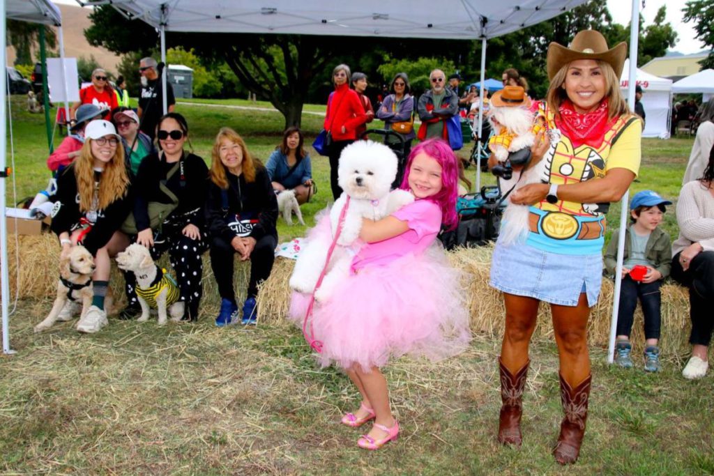 Pink and poofy, dog Tallulah and her girl took third place in the lookalike contest. Victor Carvellas