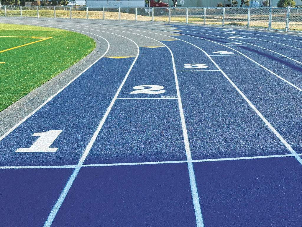The improved rubber track with bright white numbers and lane-dividers. Ethan Yan