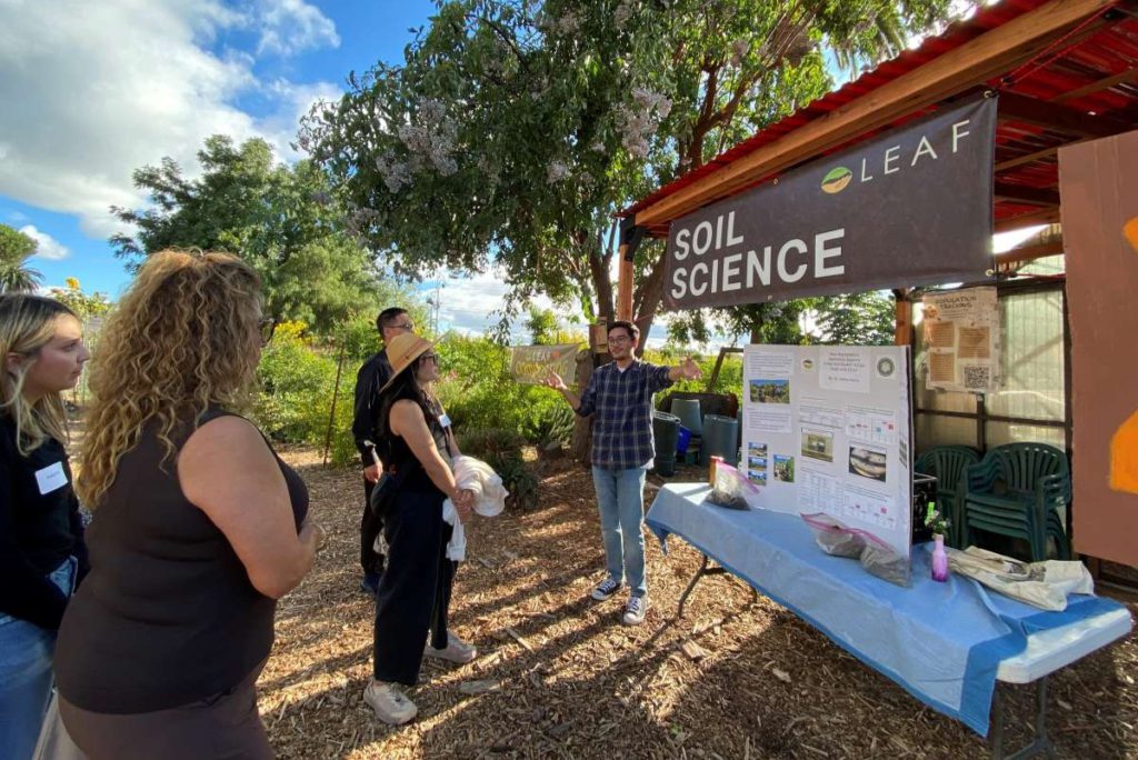 Dr. Joshua Garcia shared the results of a soil science experiment. Stephanie Uchida