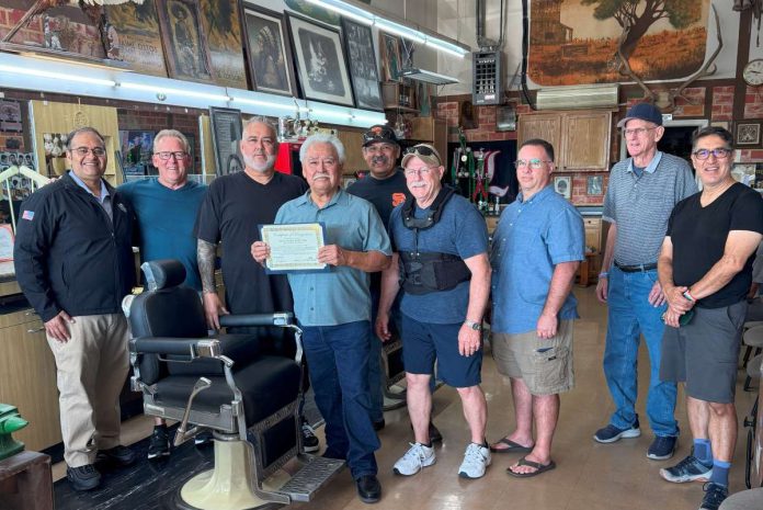 City recognizes barbershop for 50 years in business