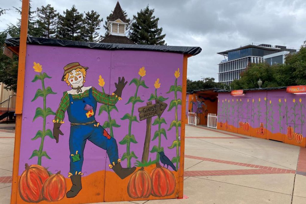 Every year, Candle Lighters volunteers work to set up carnival games for the haunted house goers.