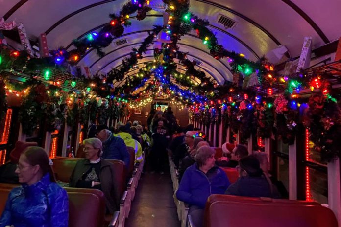 The volunteers at Niles Canyon Railway went all out with hanging wreaths and lights along the ceilings of cars. Stephanie Uchida