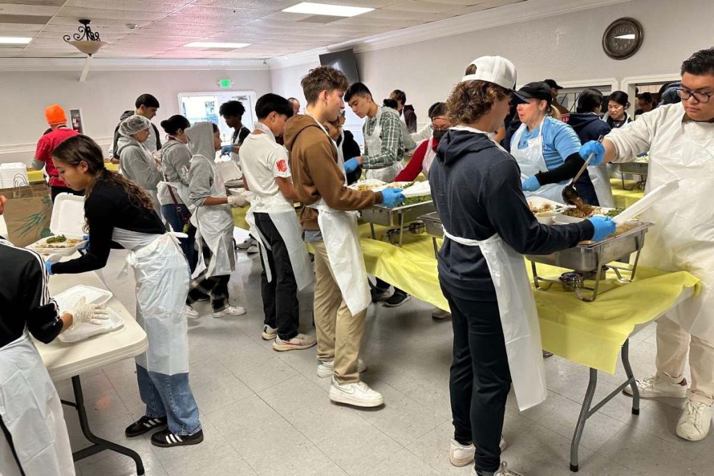 Volunteers gather at Newark Pavilion to make a Thanksgiving meal for the community.
Photos by Melanie Wong