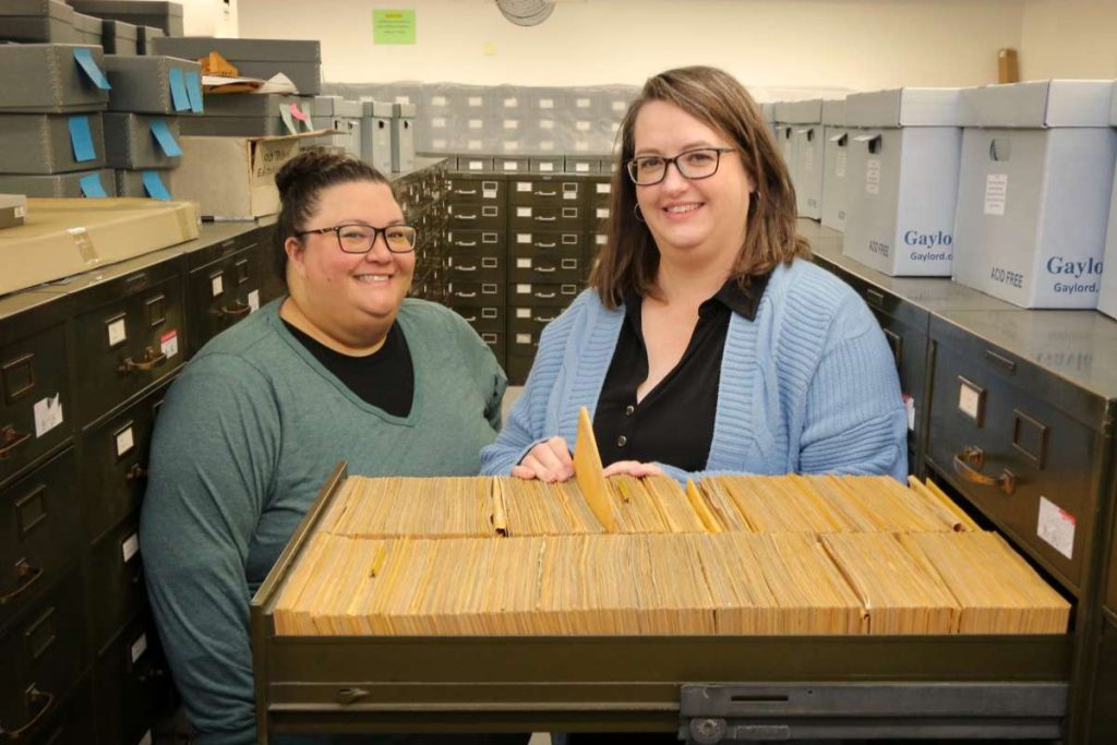 Advancement Manager Marcess Owings and Executive Director Dinae Curry show the thousands of pages in the microfiche newspaper collection.
Photos by Victor Carvellas