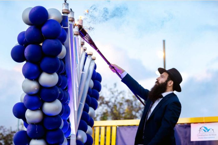 Giant floral Hanukkah Menorah lights up Fremont