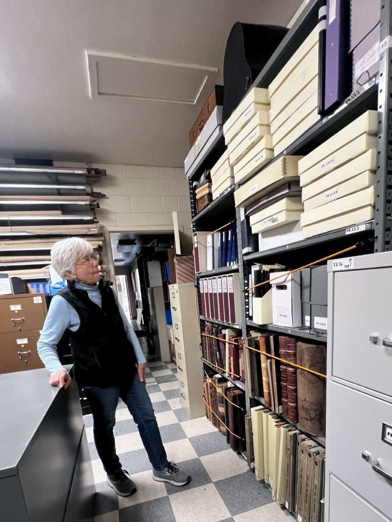 Collections Manager Barbara Baxter in the  archives room. Some records are more than a century old.
Photos by Victor Carvellas