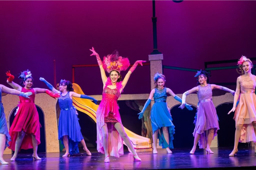 Adalyn Michelle Lowe steals the scene as Amazing Mayzie (center, in pink). 
Photos by Tracy Martin Photography