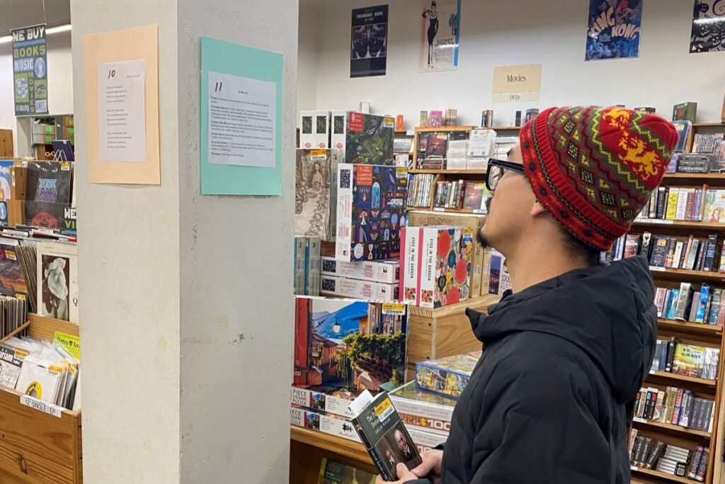 LIGHT READING People walked around Half Price Books reading the submissions—and shopping. 
Stephanie Uchida