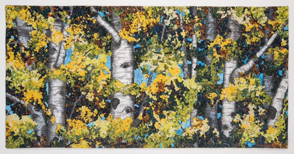 CRAFTING LAYERS Oyama Miller’s quilts are meticulously crafted through hand-dyeing, printing and layering to form vivid landscapes. 
Sibila Savage