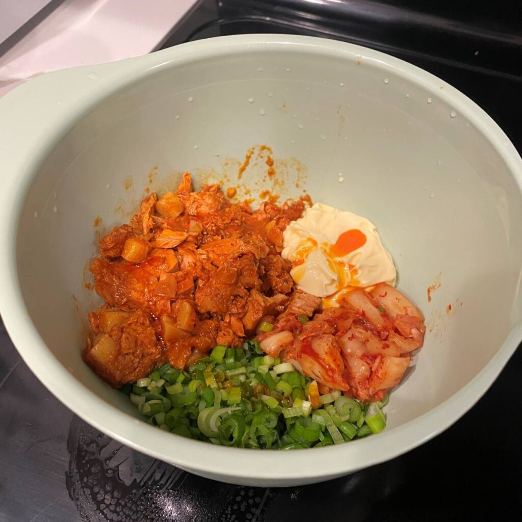 SPICE IS NICE Go easy on the sesame oil because a little goes a long way, and the tuna and kimchi are already spicy. Stephanie Uchida