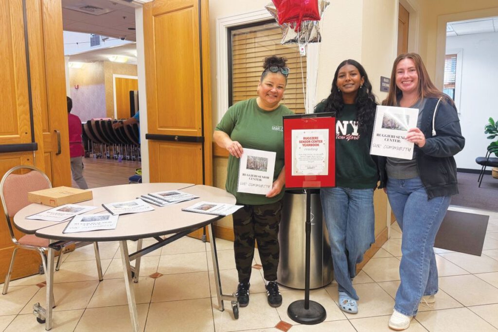 ON THE BOOKS Senior keepsake books being distributed to visitors and families at Ruggieri Senior Center in Union City. 
Photos courtesy of Aashi Gupta