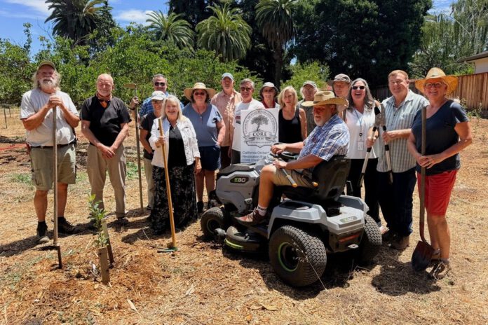 Orchard restoration group marks one year