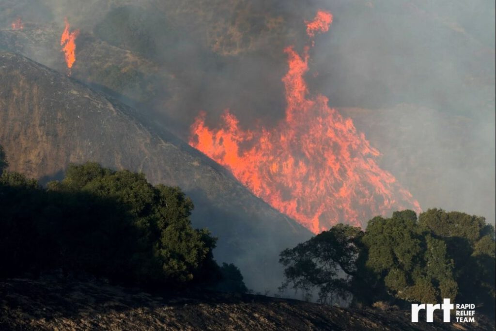 DANGER ZONE Rapid Relief Team helps first responders fighting wildfires, but the volunteers take care to stay outside the perimeter.
Photos courtesy of RRT
