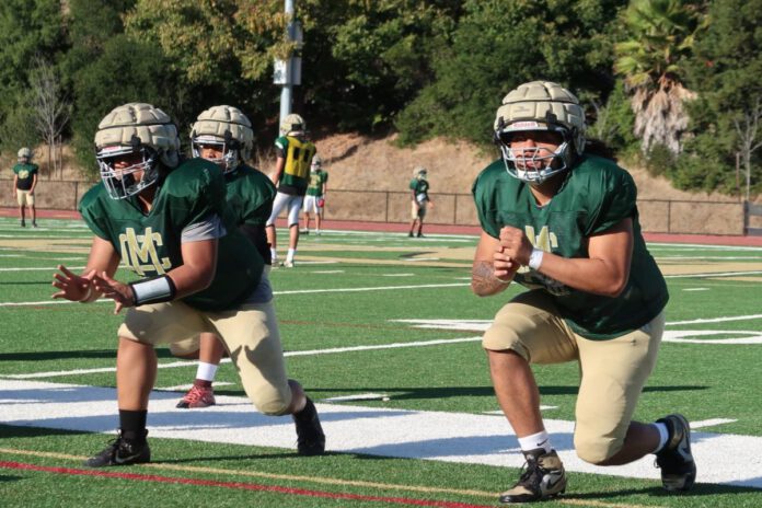 High school football rushes back