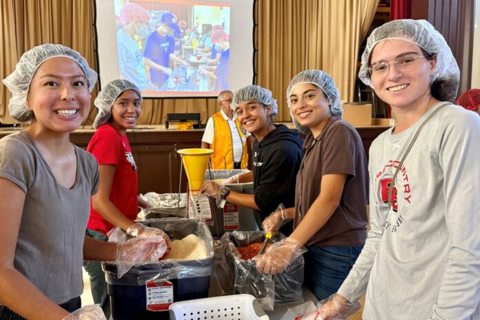 High school and Cal State East Bay students help feed the hungry