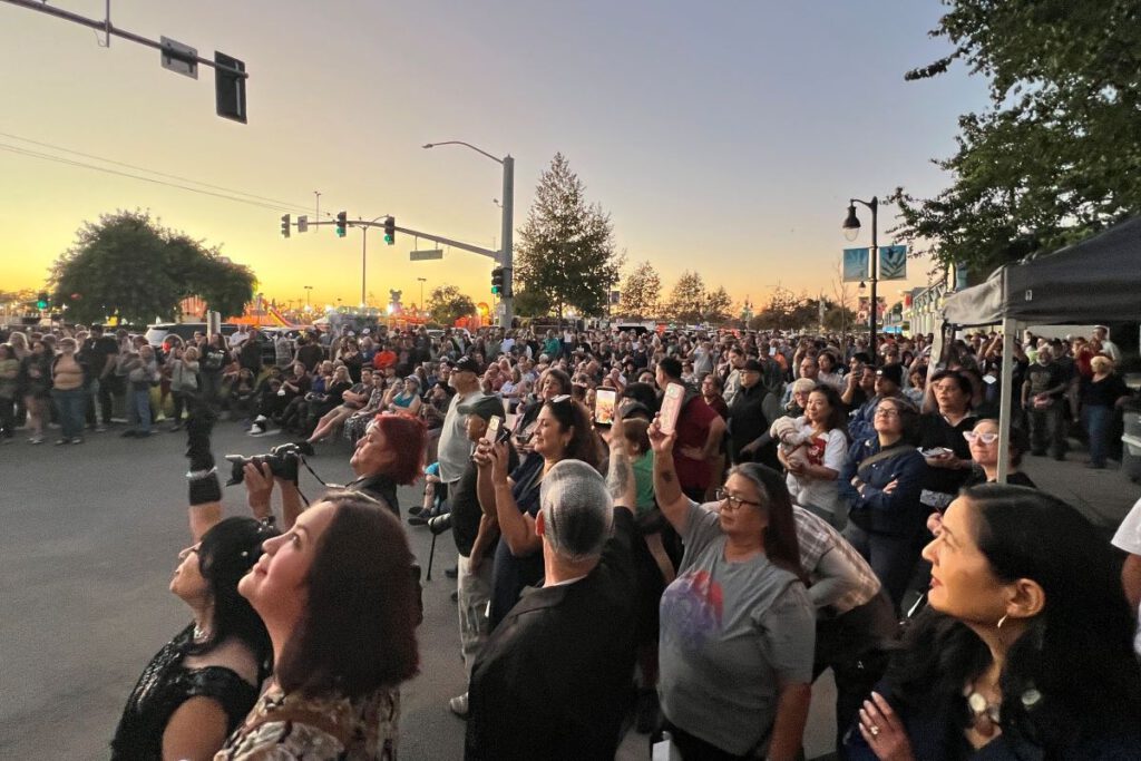 LIGHT THE NIGHT A crowd gathered to witness the marquee of Lorenzo Theatre come to life once more. David Newman